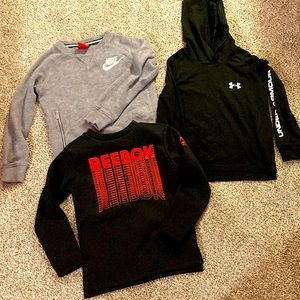 3 long sleeves pull over sweatshirts. Nike, Under Armour and Reebok